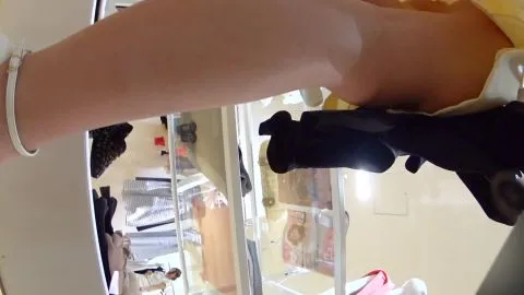 Asian Woman Tries On Clothes