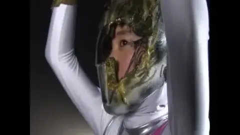 Asian Performer in Futuristic Costumes