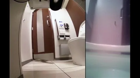 Asian Girl Urinating in Bathroom