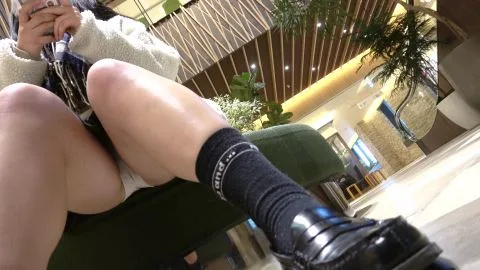 Dark-Haired Beauty in Black Socks and Boots