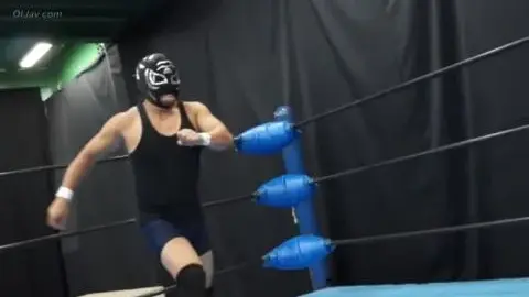 Wrestling in Ring with Masked Man and Woman