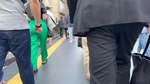 Asian Girl in Green Pants Walking