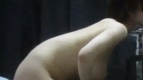 Nude Brunette Kneeling on Bed