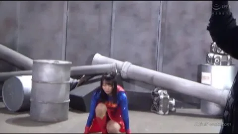 Asian Girl in Industrial Setting with Green Costumed Man