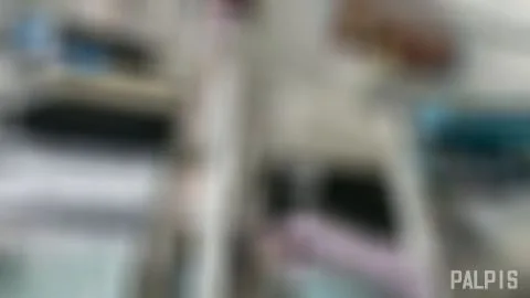 Asian Girl in Checkered Skirt in Store