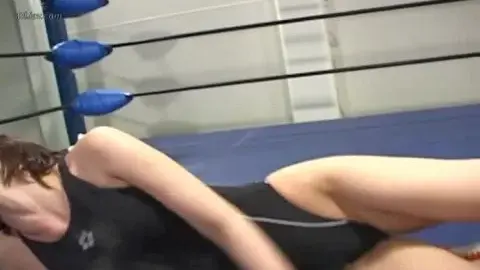 Asian Women Wrestling in Ring