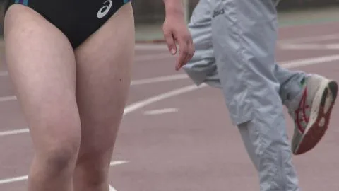 Asian Athletes at Track and Field Event