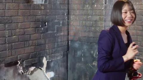 Asian Cosplay Duo in Industrial Setting