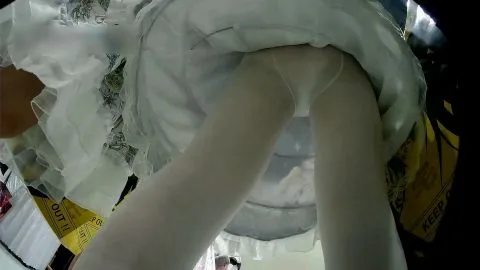 Slim Caucasian Woman in White Stockings