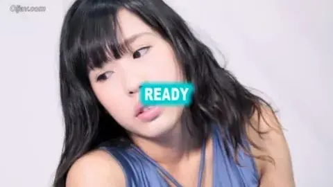 Asian Woman in Boxing Ring