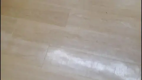 Asian Couple in Clothing Store