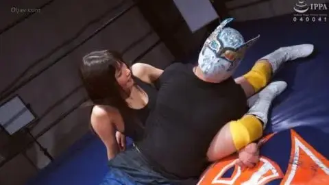 Asian Wrestlers Engage in Intense Wrestling Match