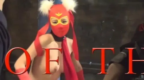 Asian BDSM Scene with Restraints and Costume