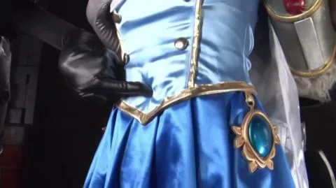 Asian Brunette in Blue Dress and Black Costumed Male