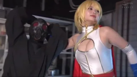 Blonde Asian in Bodysuit and Cape in Industrial Setting