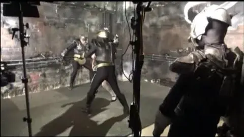 Asian Cosplay Performer in White and Black Costume