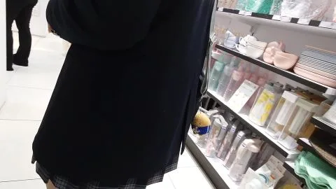 Asian Girl in Store