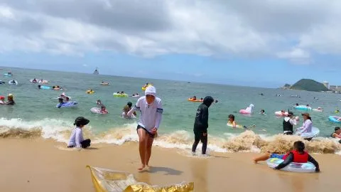 Asian Beachgoers in Swimsuits