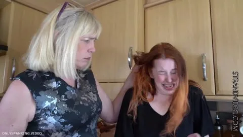 Blonde and Redhead Lesbians Spanking in Kitchen