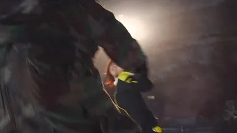 Asian Lesbians Intimate Embrace in Dimly Lit Room