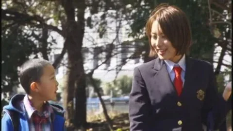 Asian Teens in School Uniforms Outdoor Encounter