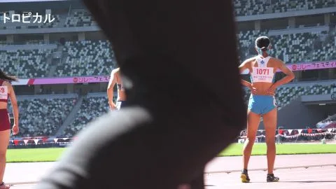 Asian Athletes in Sports Stadium