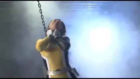 Asian Model in Metallic Costume Performs in Industrial Setting