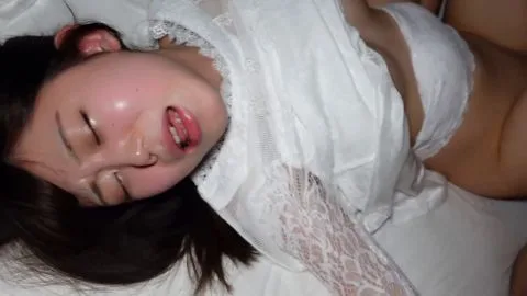 Asian Women Engage in Intimate Acts