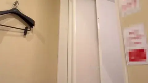 Asian Girl with Face Mask in Bathroom