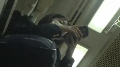 Asian Teen Schoolgirl in Uniform on Train