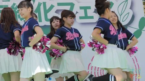 Asian Cheerleaders Outdoor Cheering