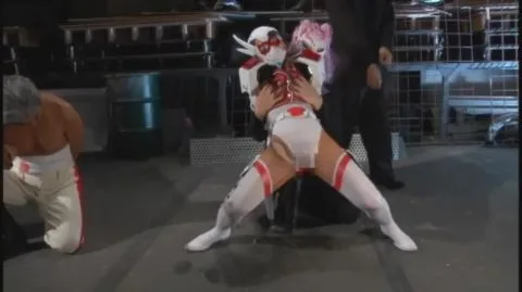 Asian Performers in Fetish Costumes Engage in BDSM Scenes