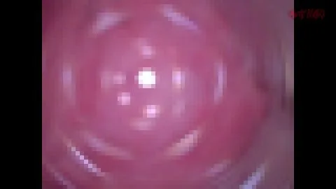 Asian Teen Uses Vibrator in Dimly Lit Bedroom