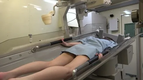 Slim Brunette in Medical Facility