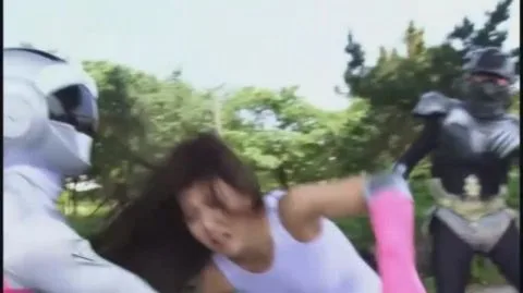 Asian Performers in Robot Costumes Engage in Explicit Acts