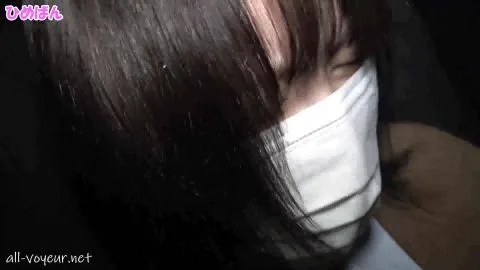 Asian Woman in Mask Touched by Man in Suit