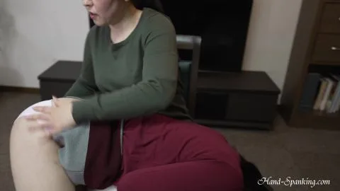 Asian Lesbians Spanking in Living Room