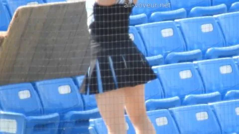 Asian Cheerleaders in Black and Blue Uniforms