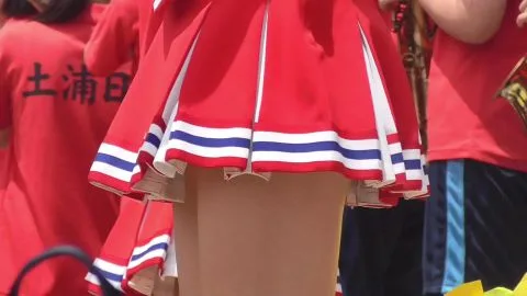 Asian Teenagers in Uniform Dance