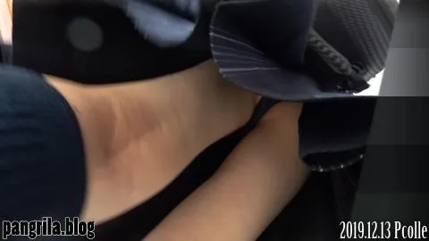 Asian Teen in Black Dress Plays in Store