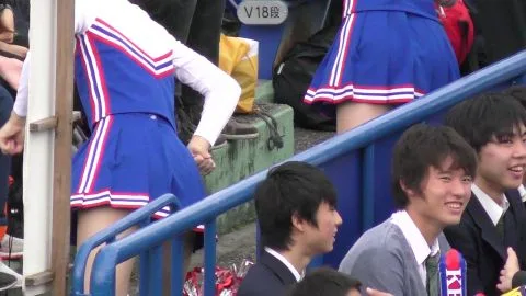 Asian Teen Cheerleaders in Blue Uniforms