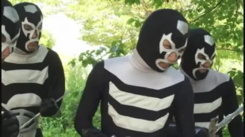 Asian Performers in Costumes Engage in Outdoor Activities