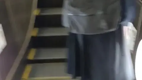 Asian Schoolgirl in Subway Station