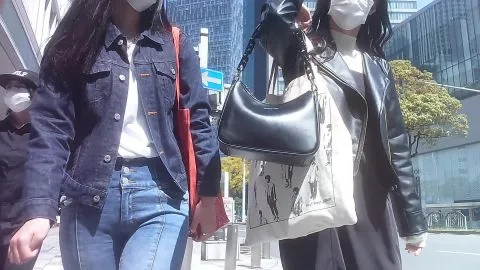 Asian Girls with Face Masks Walking on City Street