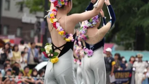 Asian Girls Dancing in White Dresses