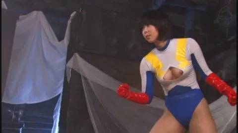 Asian Performer in Cosplay with Silver Armored Male