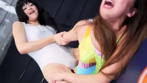 Asian Lesbians Wrestling in Ring