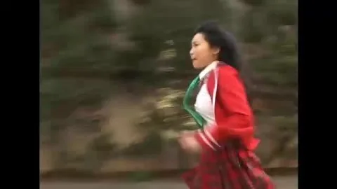 Asian Woman in Industrial Setting