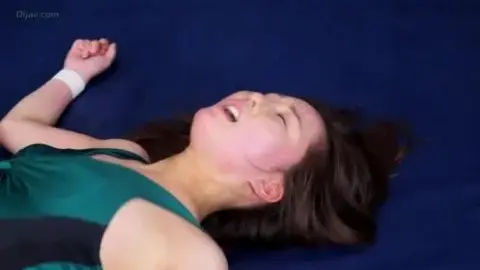 Asian Wrestlers Engage in Fierce Match