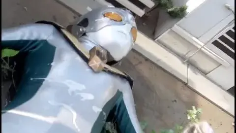 Asian Men in Costume Fight Outdoors